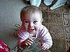 Trying to climb up on a chair